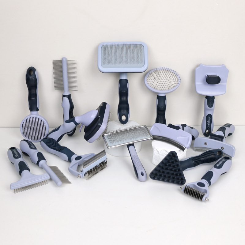 Lilac-and-black pet grooming kit showing the supplied tool assortment