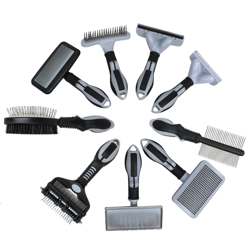 Grey-and-black pet grooming kit showing the supplied tool assortment