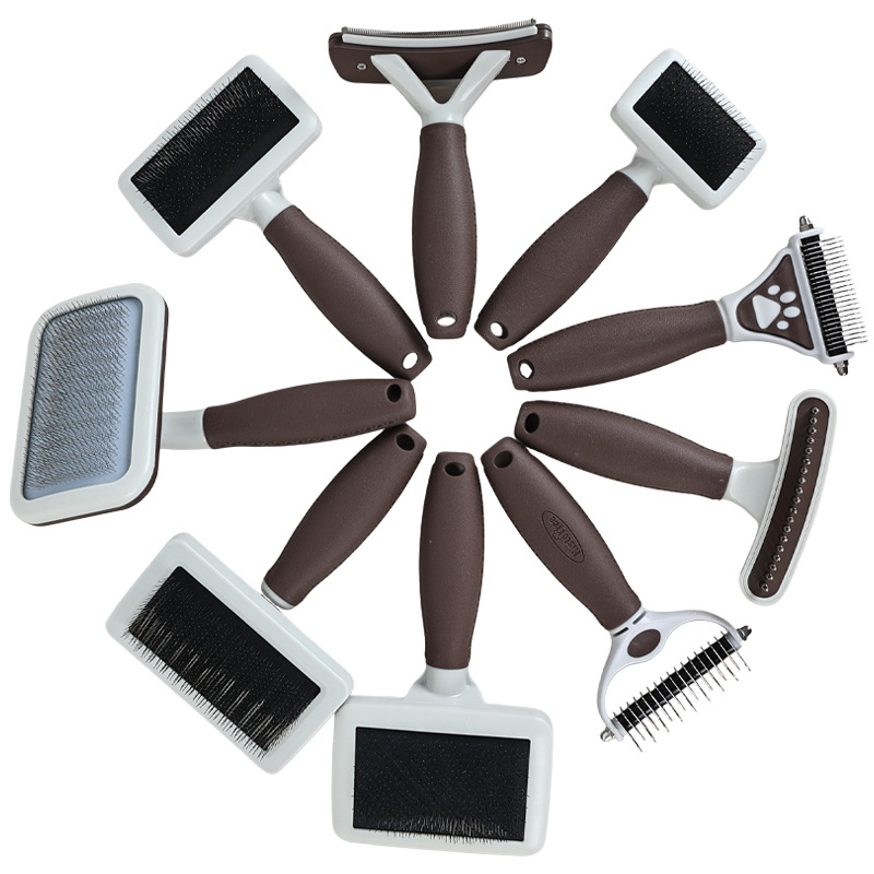 Brown-handle pet grooming kit showing the supplied tool assortment
