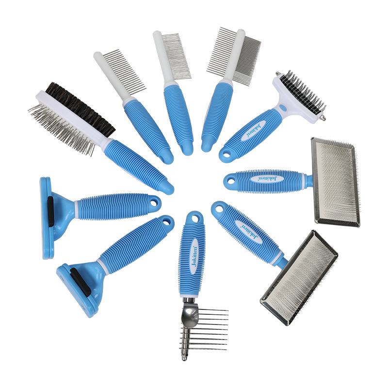 Blue-and-white pet grooming kit showing the supplied tool assortment